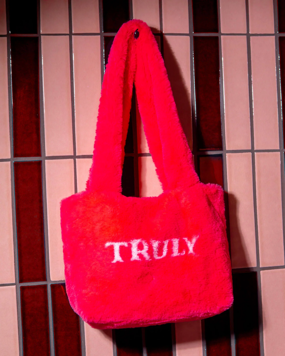 The Pink Fuzzy Bag By TRULY Beauty…Msrp$109